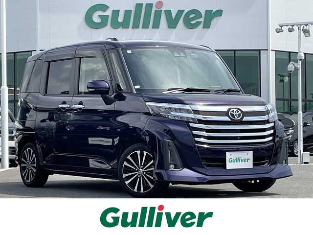 トヨタ ルーミー カスタムG－T 佐賀県 2020(令2)年 5.5万km クールバイオレットクリスタルシャイン 純正9インチSDナビゲーション/・フルセグTV/CD/DVD/SD/Bluetooth/パノラミックビューモニター/前後ドライブレコーダー/ビルトインETC/両側パワースライドドア/電子パーキングブレーキ/AUTO HOLD機能/置くだけ充電/純正レザー調シートカバー/後席サンシェード/ISOFIX対応/革巻きステアリング/ステアリングリモコン/純正15インチアルミホイール/純正LEDヘッドライト/オートマチックハイビーム/純正LEDフォグランプ/純正フロアマット/純正ドアバイザ―/新車保証書/取扱説明書/スペアキー１本/スマートアシスト/・アダプティブクルーズコントロール/・車線逸脱警報機能/・先行車発進お知らせ機能/・衝突被害軽減ブレーキ/・標識認識機能/・ふらつき警報