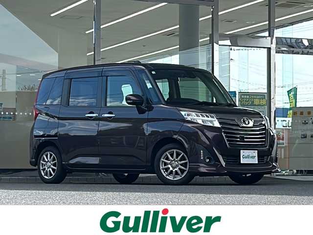 トヨタ ルーミー カスタムG－T 福島県 2016(平28)年 5.2万km プラムブラウンパールクリスタルシャイン 登録時走行距離：51642km/純正SDナビ/（フルセグ/BT接続/HDMI/USB/CD/DVD/AM/FM）/ETC/クルーズコントロール/両側パワースライドドア/衝突被害軽減ブレーキ/PUSHスタート/横滑り防止装置/アイドリングストップ/オートライト/HIDヘッドライト/シートヒーター/社外AW/純正フロアマット/コーナーセンサー/ステアリングスイッチ/保証書/取扱説明書/スペアキー