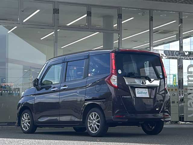 トヨタ ルーミー カスタムG－T 福島県 2016(平28)年 5.2万km プラムブラウンパールクリスタルシャイン 登録時走行距離：51642km/純正SDナビ/（フルセグ/BT接続/HDMI/USB/CD/DVD/AM/FM）/ETC/クルーズコントロール/両側パワースライドドア/衝突被害軽減ブレーキ/PUSHスタート/横滑り防止装置/アイドリングストップ/オートライト/HIDヘッドライト/シートヒーター/社外AW/純正フロアマット/コーナーセンサー/ステアリングスイッチ/保証書/取扱説明書/スペアキー