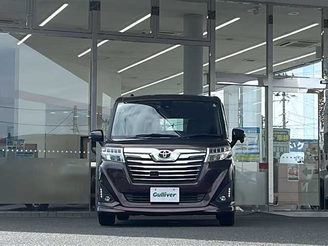 トヨタ ルーミー カスタムG－T 福島県 2016(平28)年 5.2万km プラムブラウンパールクリスタルシャイン 登録時走行距離：51642km/純正SDナビ/（フルセグ/BT接続/HDMI/USB/CD/DVD/AM/FM）/ETC/クルーズコントロール/両側パワースライドドア/衝突被害軽減ブレーキ/PUSHスタート/横滑り防止装置/アイドリングストップ/オートライト/HIDヘッドライト/シートヒーター/社外AW/純正フロアマット/コーナーセンサー/ステアリングスイッチ/保証書/取扱説明書/スペアキー