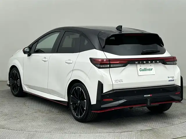日産 オーラ ニスモ チューンド e－パワー 4WD 道央・札幌 2024(令6)年 0.1万km ピュアホワイトパール / スーパーブラック 2トーン ・４WD/・寒冷地仕様/・プロパイロット/・衝突軽減ブレーキ/・横滑り防止機能/・ハンドル支援/・側方支援/・後方支援/・アダプティブクルーズコントロール/・レーンアシスト/・ＢＯＳＥサウンド/・全方位カメラ/・純正ナビ/・フルセグＴＶ＆ＢＴ＆ＣＤ＆ＤＶＤ＆ＨＤＭＩ/・パワーシート/・ステアリングヒーター/・デジタルインナーミラー/・前後障害物センサー/・ワイヤレス充電/・オートエアコン/・オートライト/・オートハイビーム/・ETC２．０/・電動パーキングブレーキ/・ブレーキオートホールド