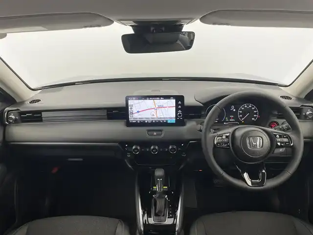 ホンダ ヴェゼル ハイブリッド e:HEV Z 富山県 2025(令7)年 0.1千km クリスタルブラックパール 登録済未使用車/9インチHonda CONNECTディスプレイ/（AM/FM/USB/BT/AppleCarPlay/AndroidAuto）/フルセグTV/バックカメラ/アダプティブクルーズコントロール/衝突被害軽減ブレーキ/レーンキープアシスト/オートマチックハイビーム/LEDヘッドライト/クリアランスソナー/ブラインドスポットモニター/電動リアゲート/ハーフレザーシート/前席シートヒーター/ビルトインETC2.0/置くだけ充電/スマートキー×２/プッシュスタート/パドルシフト/取扱説明書/保証書