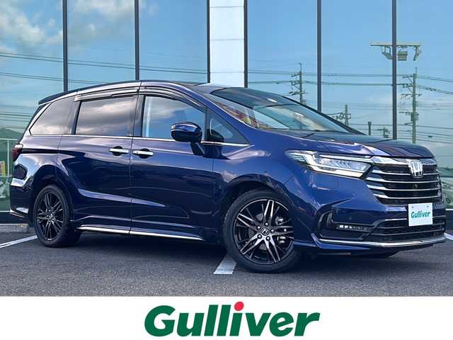 ホンダ オデッセイ ハイブリッド e:HEVアブソルート EX 福岡県 2021(令3)年 3.2万km オブシダンブルーパール ワンオーナー/本革レザーシート/純正メモリナビ/VXU-217DYi/HDMI接続/DVD/CD再生/SD再生/BT接続/ＢＳＭ/３６０°モニター/レーダークルーズコントロール/両側パワースライドドア/シートヒーター/パワーバックドア/ＥＴＣ２．０/カーテンエアバック