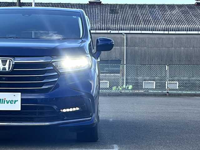 ホンダ オデッセイ ハイブリッド e:HEVアブソルート EX 福岡県 2021(令3)年 3.2万km オブシダンブルーパール ワンオーナー/本革レザーシート/純正メモリナビ/VXU-217DYi/HDMI接続/DVD/CD再生/SD再生/BT接続/ＢＳＭ/３６０°モニター/レーダークルーズコントロール/両側パワースライドドア/シートヒーター/パワーバックドア/ＥＴＣ２．０/カーテンエアバック