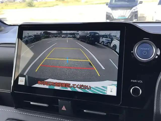 トヨタ ノア ハイブリッド S－Z 鳥取県 2023(令5)年 2.7万km アティチュードブラックマイカ 10.5インチディスプレイオーディオ/ナビ/BT/USB/Mira/バックカメラ・ETC２．０/トヨタセーフティセンス/アドバンストドライブ/ブラインドスポットモニター/モデリスタエアロパーツ/フロント/サイド/リア/快適利便パッケージHi/前席2列目シートヒーター/2列目オットマンシート/パワーバックドア/両側パワースライドドア/ハーフレザーシート/3眼プロジェクター式LEDヘットライト/フォグライト/純正17インチアルミホイール/プッシュエンジンスタート/スマートキー