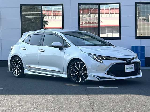トヨタ カローラ スポーツ ハイブリッドG Z 山口県 2020(令2)年 3.5万km ホワイトパールクリスタルシャイン ワンオーナー/モデリスタフルエアロ/純正ディスプレイオーディオ/・ナビキット/・Bluetooth接続/・AM/FMラジオ/・Miracast/・Apple Car Play/・Android Auto/バックカメラ/前後ドライブレコーダー/ETC/プッシュスタート/スマートキー/スペアキー/シートヒーター/純正１８インチアルミホイール/Toyota Safety Sense/・プリクラッシュセーフティ/・レーントレーシングアシスト/・全車速追従機能付レーダークルーズコントロール/・オートマチックハイビーム/・ロードサインアシスト/インテリジェントクリアランスソナー/車両接近通報装置/ドライブスタートコントロール/取扱説明書/保証書