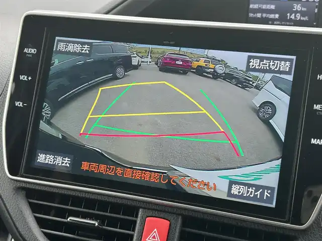 トヨタ エスクァイア ハイブリッド Gi プレミアムパッケージ ブラックテーラード 大阪府 2021(令3)年 1.4万km ブラック 純正１０インチナビ/  フルセグTV/CD/DVD/Bluetooth/USB/衝突軽減/バックモニター/１２インチ後席モニター/前席シートヒーター/両側パワースライドドア/クルーズコントロール/ドライブレコーダー/コーナーセンサー/純正15インチアルミホイール/純正フロアマット/100V電源/スマートキー/ワンオーナー/ＥＴＣ/ＬＥＤライト