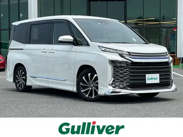 トヨタ ヴォクシー ハイブリッド S－Z 奈良県 2022(令4)年 5.5万km ホワイトパールクリスタルシャイン 10.5インチディスプレイオーディオ /ナビキット /14インチ後席モニター /フルモデリスタエアロ /フルセグTV /パワーバックドア /ハーフレザーシート /シートヒーター前後席 /ステアリングヒーター /前後ドライブレコーダー/ETC2.0/レーダークルーズコントロール/純正アルミホイール/LEDヘッドライト/バックカメラ/スペアキー