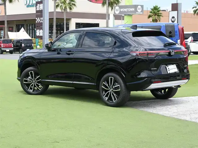 ホンダ ヴェゼル ハイブリッド e:HEV Z 千葉県 2025(令7)年 0.1千km クリスタルブラックパール e:HEV Z　3VC4AZ　Honda CONNECTディスプレー+ETC2.0車載器+ワイヤレス充電器(220000)/ホンダセンシング/・衝突軽減ブレーキ（CMBS）/・車線維持支援システム（LKAS）/・アダプティブクルーズコントロール（ACC）/・後方誤発進抑制機能/・誤発進抑制機能/ハーフレザーシート/前席シートヒーター/純正コネクトナビ/地デジTV/【Bluetooth接続】/【Apple CarPlay　Android Auto対応】/バックカメラ/ワイヤレス充電/革巻きステアリング/ステアリングヒーター/ステアリングスイッチ/パドルシフト/ETC（2.0）/LEDヘッドライト/フォグライト/ウインカーミラー/コーナーセンサー/純正18インチアルミホイル/サイド/カーテンエアバッグ/Honda スマートキー