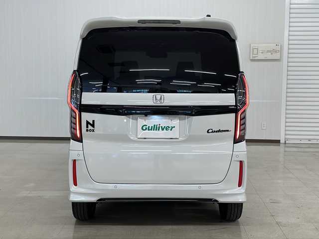 ホンダ Ｎ ＢＯＸ カスタム L スタイル+ブラック 熊本県 2023(令5)年 1.2万km プラチナホワイトパール 社外SDナビ（BT、DVD、CD、ラジオ、フルセグ）/ETC/バックカメラ/ドライブレコーダー/クルーズコントロール/両側パワースライドドア/シートヒーター/カスタムLターボ用純正ブラック15インチAW/オートハイビーム/オートライト/・LEDヘッドライト/・フォグランプ/レーンキープアシスト/横滑り防止/衝突被害軽減ブレーキ/プッシュスタート/スマートキー/・スペアキー