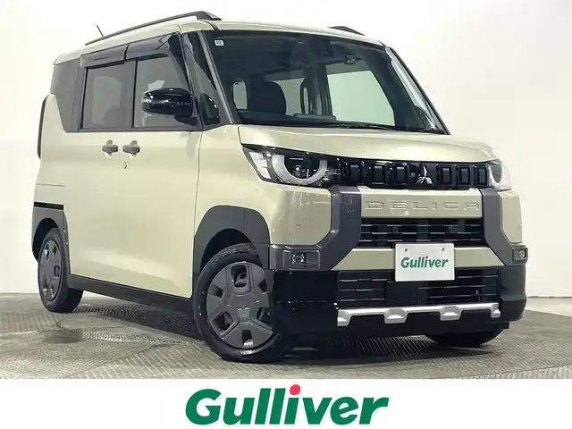 三菱 デリカミニ G 大阪府 2024(令6)年 0.7万km ベージュ 社外ナビＴＶ　衝突軽減　バックカメラ　ＥＴＣ　シートヒーター　ドラレコ　ルーフレール　片側電動　レーンアシスト　アイドリングストップ　オートライト　ＬＥＤヘッドライト　スマートキー　プッシュスタート