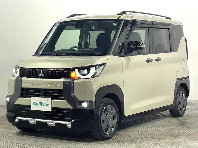 三菱 デリカミニ G 大阪府 2024(令6)年 0.7万km ベージュ 社外ナビＴＶ　衝突軽減　バックカメラ　ＥＴＣ　シートヒーター　ドラレコ　ルーフレール　片側電動　レーンアシスト　アイドリングストップ　オートライト　ＬＥＤヘッドライト　スマートキー　プッシュスタート