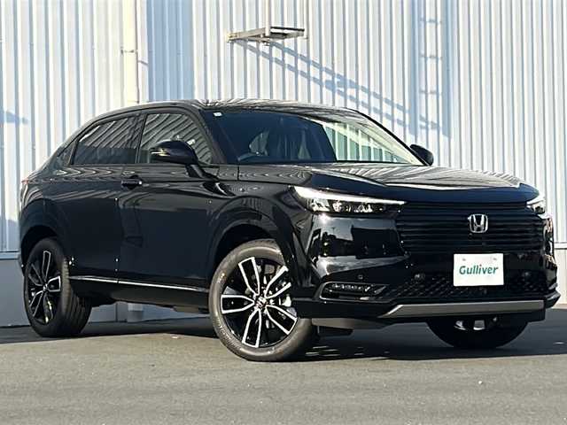 ホンダ ヴェゼル ハイブリッド e:HEV Z 三重県 2025(令7)年 0.1千km クリスタルブラックパール 登録済未使用車/純正ナビ/アップルカープレイ/アンドロイドオート/BSM/バックカメラ/追従クルーズコントロール/シートヒーター/電動リアゲート/純正ビルトインETC2.0/ワイヤレス充電/ステアリングヒーター/ステアリングスイッチ/レーンキープアシスト/衝突軽減ブレーキ/電子パーキング/LEDヘッドライト/禁煙車