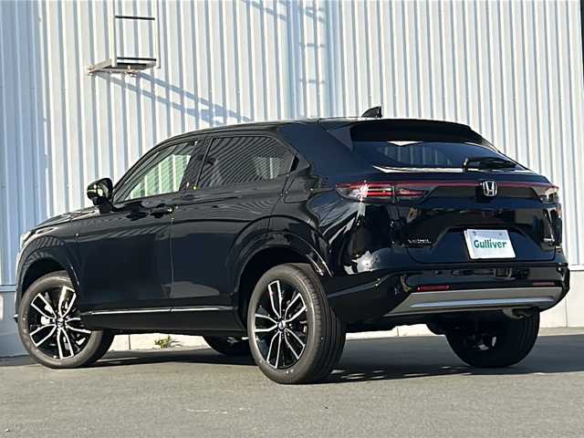 ホンダ ヴェゼル ハイブリッド e:HEV Z 三重県 2025(令7)年 0.1千km クリスタルブラックパール 登録済未使用車/純正ナビ/アップルカープレイ/アンドロイドオート/BSM/バックカメラ/追従クルーズコントロール/シートヒーター/電動リアゲート/純正ビルトインETC2.0/ワイヤレス充電/ステアリングヒーター/ステアリングスイッチ/レーンキープアシスト/衝突軽減ブレーキ/電子パーキング/LEDヘッドライト/禁煙車