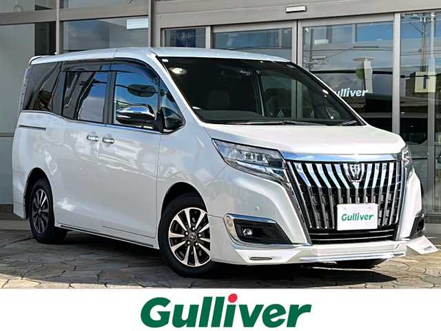 トヨタ エスクァイア Gi 静岡県 2018(平30)年 4.9万km ホワイトパールクリスタルシャイン ダイナミックエアロスタイル/トヨタセーフティセンス/プリクラッシュセーフティ/レーンキープアシスト/オートハイビーム/先行車発進のお知らせ/純正10インチナビ/フルセグTV/バックカメラ/純正12インチフリップダウンモニター/純正アルミホイール/ETC/LEdヘッドライト/黒革シート/シートヒーター/クリアランスソナー/クルーズコントロール/ドライブレコーダー/横滑り防止装置