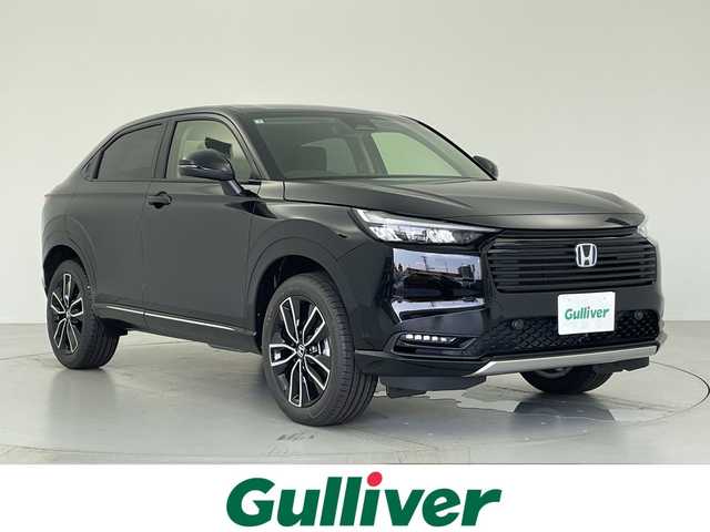 ホンダ ヴェゼル ハイブリッド e:HEV Z 愛知県 2025(令7)年 0.1千km クリスタルブラックパール 登録済未使用車　2km/純正9型ナビ/・Bluetooth/・フルセグテレビ/ワイヤレス充電器/ビルトインETC2.0/バックカメラ/シートヒーター/ステアリングヒーター/ハーフレザーシート/衝突軽減ブレーキ/レーンキープアシスト/オートマチックハイビーム/前後コーナーセンサー/ダウンヒルアシストコントロール/レーダークルーズコントロール/LEDヘッドライト
