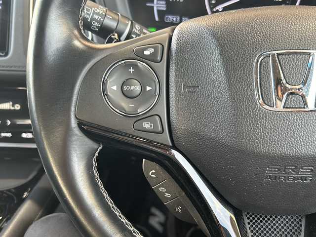 ホンダ ヴェゼル ハイブリッド Z ホンダセンシング 静岡県 2019(平31)年 2.4万km ミッドナイトブルービームM 純正8インチナビ/・CD/DVD/・FM/AM/・フルセグTV/・USB/・HDMI/・Bluetooth/・SD/Music Rack/ホンダセンシング/●衝突軽減ブレーキ〈CMBS〉/●誤発進抑制機能/●歩行者事故低減ステアリング/●路外逸脱抑制機能/●ACC〈アダプティブ・クルーズ・コントロール〉/●LKAS〈車線維持支援システム〉/●先行車発進お知らせ機能/●標識認識機能/主要装備/・純正エアロ/・バックカメラ/・ビルトインＥＴＣ/・ＬＥＤヘッドライト/・フォグランプ/・ハーフレザーシート/・１７インチ純正ＡＷ/・運転席+助手席シートヒーター/・純正ドラレコ/・パドルシフト/・サイドカーテンエアバッグ/・ルーフレール