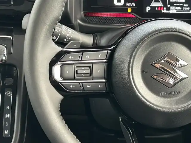スズキ スペーシア カスタム HYBRID XS ターボ 福島県 2025(令7)年 0.1千km ピュアホワイトパール/ブラック2トーン スズキセーフティサポート/デュアルセンサーブレーキサポートII/アダプティブクルーズコントロール（ACC）/車線維持支援機能/車線逸脱抑制機能/車線逸脱警報機能/ふらつき警報機能/標識認識機能/ハイビームアシスト/発進お知らせ機能/ヘッドアップディスプレイ/誤発進抑制機能/後方誤発進抑制機能/スズキコネクト対応通信機装着車/純正ナビゲーション/【CD/DVD/USB/HDMI/BT/TV】/全方位モニター/ドライブレコーダー１２型デジタルミラー/型番：DVR-DM1246A-IC/フリップダウンモニター/ビルトインETC/両側電動スライドドア/前席シートヒーター/ステアリングヒーター/ステアリングリモコン/パドルシフト/シートバックテーブル/リアサーキュレーター/後席マルチユースフラップ/リアドアロールサンシェード/LEDオートライト/LEDフォグランプ/純正フロアマット/純正ドアバイザー