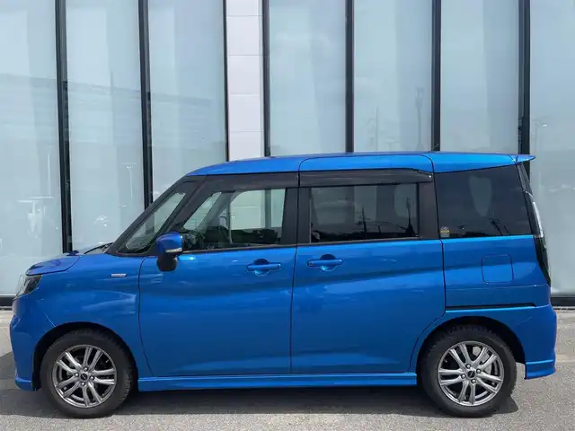 スズキ ソリオ HV MZ 大阪府 2021(令3)年 2.4万km スピーディーブルーM 全方位カメラ /パーキングアシスト /ETC /Bluetooth /追従走行型クルーズコントロール　/シートヒーター　/前後ドライブレコーダー　/純正フロアマット　/メモリーナビ　/純正ナビ　/フルセグテレビ　/プッシュスタート/両側パワースライドドア