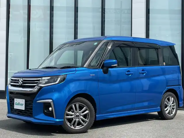 スズキ ソリオ HV MZ 大阪府 2021(令3)年 2.4万km スピーディーブルーM 全方位カメラ /パーキングアシスト /ETC /Bluetooth /追従走行型クルーズコントロール　/シートヒーター　/前後ドライブレコーダー　/純正フロアマット　/メモリーナビ　/純正ナビ　/フルセグテレビ　/プッシュスタート/両側パワースライドドア