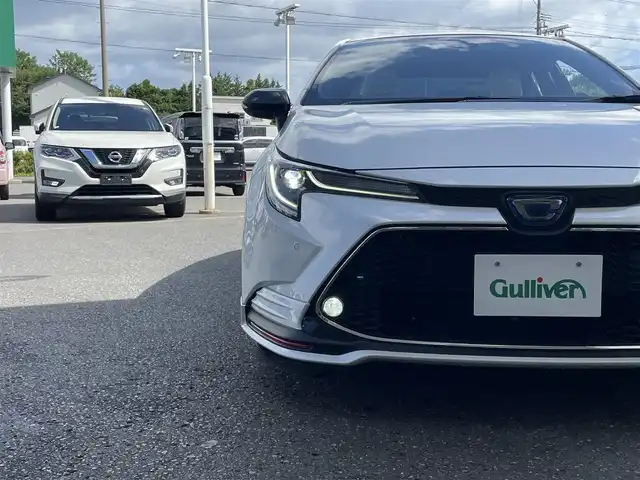 トヨタ カローラ ハイブリット ダブルバイビー 青森県 2020(令2)年 4.5万km ホワイトパールクリスタルシャイン ４WD/純正ディスプレイオーディオ/フルセグ/BT/ETC/ドライブレコーダー/ハンズフリー/ヘッドアップディスプレイ/クルーズコントロール/ブラインドスポットモニター/バックカメラ/ステアリングリモコン/トヨタセーフティセンス