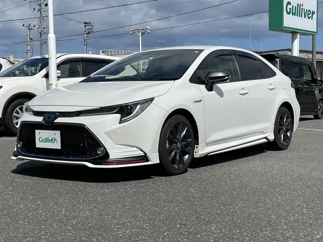 トヨタ カローラ ハイブリット ダブルバイビー 青森県 2020(令2)年 4.5万km ホワイトパールクリスタルシャイン ４WD/純正ディスプレイオーディオ/フルセグ/BT/ETC/ドライブレコーダー/ハンズフリー/ヘッドアップディスプレイ/クルーズコントロール/ブラインドスポットモニター/バックカメラ/ステアリングリモコン/トヨタセーフティセンス
