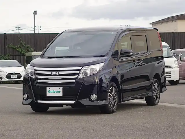 トヨタ ノア Si 山形県 2015(平27)年 5.4万km ブラック 4WD/ワンオーナー/Androidナビ/　　【BT】/両側パワースライドドア/LEDオートヘッドライト/純正16インチアルミホイール/アイドリングストップ/ステアリングスイッチ/MTモード付AT/電動格納ウィンカーミラー/フォグランプ/WAAC/スマートキー/ETC
