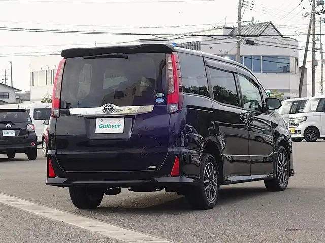 トヨタ ノア Si 山形県 2015(平27)年 5.4万km ブラック 4WD/ワンオーナー/Androidナビ/　　【BT】/両側パワースライドドア/LEDオートヘッドライト/純正16インチアルミホイール/アイドリングストップ/ステアリングスイッチ/MTモード付AT/電動格納ウィンカーミラー/フォグランプ/WAAC/スマートキー/ETC