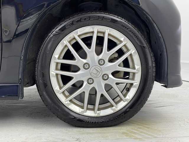 ホンダ Ｎ ＢＯＸ L ターボ 茨城県 2021(令3)年 5.7万km クリスタルブラックパール 純正８型ナビ　バックモニター　フルセグＴＶ　衝突軽減ブレーキ　両側電動スライドドア　ＬＥＤライト　シートヒーター　コーナーセンサー　ビルトインＥＴＣ　横滑り防止装置　スマートキー　純正アルミホイール