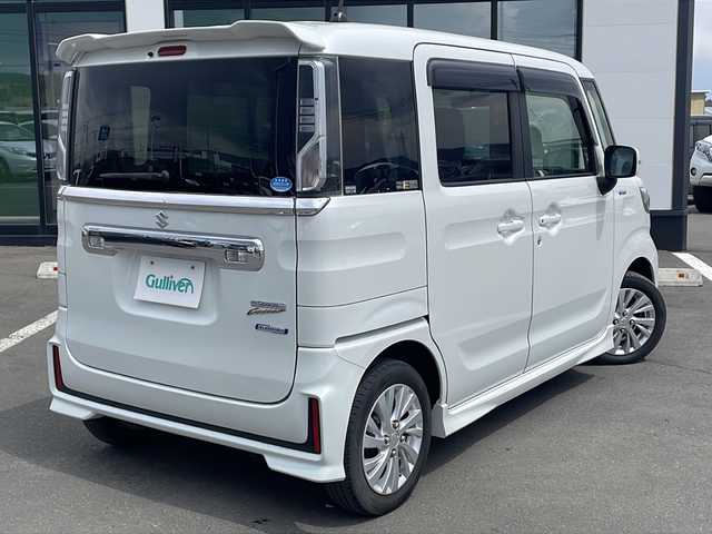 スズキ スペーシア カスタム HYBRID GS 道東・釧路十勝 2018(平30)年 6.9万km ピュアホワイトP ・4WD/・社外メモリナビ/（CD・DVD・BT・SD・フルセグ）/・片側パワースライドドア/・スマートキー/・プッシュスタート/・LEDオートライト/・フォグランプ/・シートヒーター/・ステアリングスイッチ/・ETC/・純正14インチアルミホイール