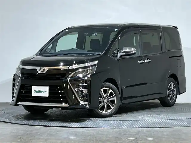 トヨタ ヴォクシー ZS 煌Ⅱ 愛媛県 2019(令1)年 5.1万km ブラック 純正SDナビ/(AM/FM/CD/DVD/Bluetooth/フルセグ)/衝突被害軽減ブレーキ/レーンキープアシスト/コーナーセンサー/バックカメラ/フリップダウンモニター/クルーズコントロール/両側パワースライドドア/前後ドライブレコーダー/アイドリングストップ/オートマチックハイビーム/オートライト/フォグランプ/ウィンカーミラー/ドアバイザー/プッシュスタート/ETC/ECOモード/スペアキー/保証書・取扱説明書