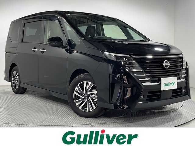 日産 セレナ e－パワー ハイウェイスター V 広島県 2023(令5)年 0.9万km ダイヤモンドブラック 禁煙車/純正９型ディスプレイオーディオ/アラウンドビューモニター/インテリジェントルームミラー/ハンズフリー付両側パーワースライドドア/ホールド機能付電動パーキングブレーキ/プロパイロット/ＥＴＣ/オートマチックハイビーム/コーナーセンサー/レーンキープアシスト/衝突軽減/踏み間違い防止/フォグランプ/LEDヘッドライト/エアバッグ(運転席/助手席/サイド/カーテン)/純正16インチアルミホイール (205/65/16)