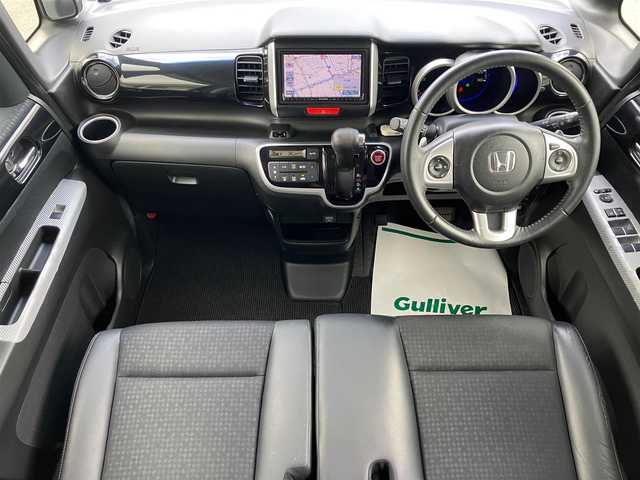 ホンダ Ｎ ＢＯＸ カスタム G ターボ Lパッケージ 静岡県 2015(平27)年 6万km プレミアムベルベットパープル・パール エンジンスタートボタン/保証書/取扱説明書/記録簿/パワーステアリング/パワーウィンドウ/パドルシフト/アイドリングストップ/ターボ/スマートキー/オートエアコン/スペアキー/クルーズコントロール/メモリナビ（CD/DVD/BT/ワンセグ）/ETC/バックカメラ/ドライブレコーダー/ベンチシート/純正フロアマット/ハーフレザーシート/両側パワースライドドア/RAYS16インチアルミホイール/ABS/横滑り防止装置/LEDヘッドライト/オートライト/社外LEDテールライト（純正車載）/Wプラスサイドエアバック/衝突軽減システム/カーテンエアバック
