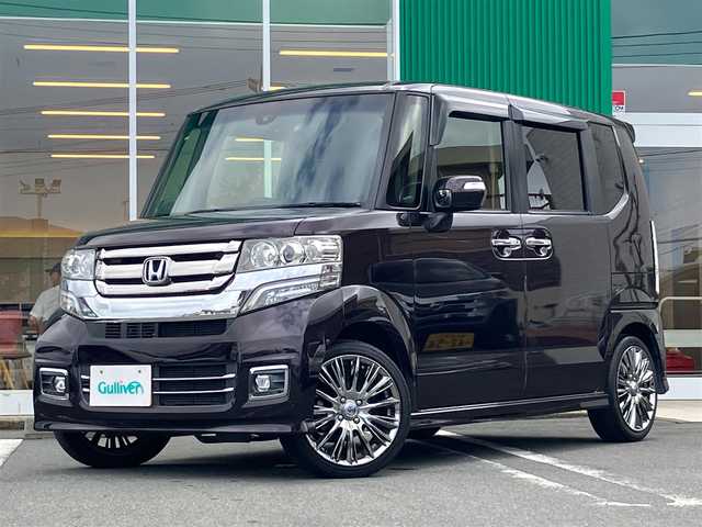 ホンダ Ｎ ＢＯＸ カスタム G ターボ Lパッケージ 静岡県 2015(平27)年 6万km プレミアムベルベットパープル・パール エンジンスタートボタン/保証書/取扱説明書/記録簿/パワーステアリング/パワーウィンドウ/パドルシフト/アイドリングストップ/ターボ/スマートキー/オートエアコン/スペアキー/クルーズコントロール/メモリナビ（CD/DVD/BT/ワンセグ）/ETC/バックカメラ/ドライブレコーダー/ベンチシート/純正フロアマット/ハーフレザーシート/両側パワースライドドア/RAYS16インチアルミホイール/ABS/横滑り防止装置/LEDヘッドライト/オートライト/社外LEDテールライト（純正車載）/Wプラスサイドエアバック/衝突軽減システム/カーテンエアバック