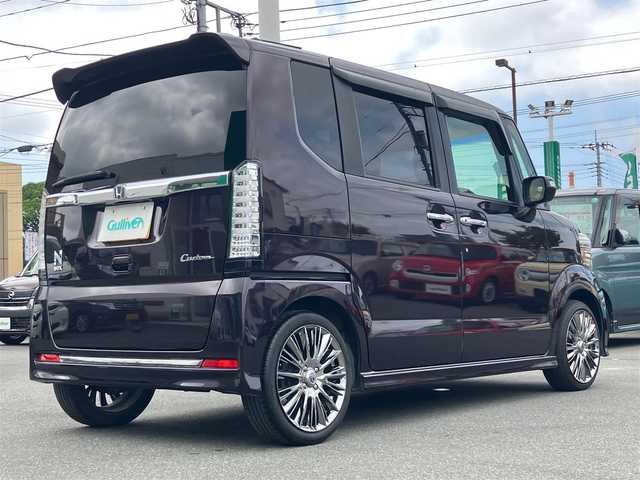 ホンダ Ｎ ＢＯＸ カスタム G ターボ Lパッケージ 静岡県 2015(平27)年 6万km プレミアムベルベットパープル・パール エンジンスタートボタン/保証書/取扱説明書/記録簿/パワーステアリング/パワーウィンドウ/パドルシフト/アイドリングストップ/ターボ/スマートキー/オートエアコン/スペアキー/クルーズコントロール/メモリナビ（CD/DVD/BT/ワンセグ）/ETC/バックカメラ/ドライブレコーダー/ベンチシート/純正フロアマット/ハーフレザーシート/両側パワースライドドア/RAYS16インチアルミホイール/ABS/横滑り防止装置/LEDヘッドライト/オートライト/社外LEDテールライト（純正車載）/Wプラスサイドエアバック/衝突軽減システム/カーテンエアバック