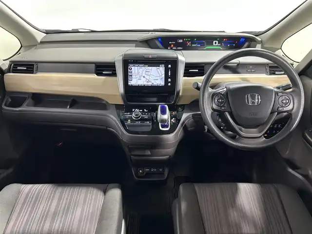 ホンダ フリード ハイブリット G ホンダセンシング 大阪府 2017(平29)年 1.7万km モダンスティールM 純正SDナビ（CD/DVD/Bluetooth）/フルセグTV/バックカメラ/衝突軽減システム/レーンアシスト/ドライブレコーダー/アイドリングストップ/クルーズコントロール/プッシュスタート/両側パワースライドドア/LEDヘッドライト/ETC
