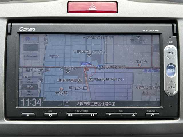 ホンダ フリード ハイブリット ジャストセレクション 大阪府 2014(平26)年 4.4万km ホワイトオーキッドパール 純正メモリナビ（VXM-207VFEi）/・ワンセグテレビ/・CD/DVD/・AM/FM/BT/バックカメラ/安全装備/・運転席用＆助手席用SRSエアバックシステム/・EBD（電子制御動力配分システム）付ABS/・VSA（ABS＋TCS＋横滑り制御）/・ヒルスタートアシスト/・ディスチャージヘッドライト＜HID＞/（ハイ/ロービーム、オートレベリング/オートライトコントロール機構付）/・クルーズコントロール/両側パワースライドドア/ETC/前後ドライブレコーダー（DRV-MR870）/革巻きステアリング/ステアリングスイッチ/取扱説明書/保証書/スペアキー1本