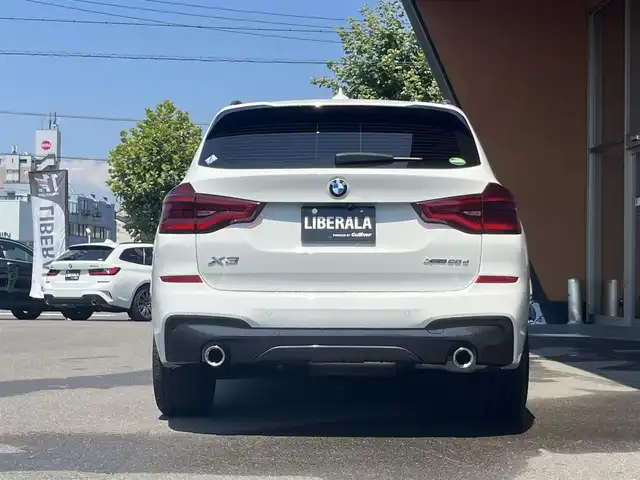 ＢＭＷ Ｘ３ xDrive20d Mスポーツ 岐阜県 2019(令1)年 2.7万km アルピンホワイトⅢ ドライビングアシストプラス/ACCアクティブクルーズ・コントロール（ストップ&ゴー機能付） /ステアリング&レーンコントロールアシスト /レーンディパーチャーウォーニング（車線逸脱警告システム） /レーン・チェンジウォーニング /アクティブ・サイドコリジョン・プロテクション /前車接近警告機能 /衝突回避被害軽減ブレーキ /事故回避アシスト /後車衝突警告機能 /クロストラフィックウォーニング（フロント&リヤ）　/パーキングアシストプラス/パーク・ディスタンス・コントロール （フロント&リヤ、ビジュアル表示機能付） /パーキング・アシスト（並列・縦列） /トップ・ビュー ー サイド・ビューカメラ ー リヤビュー・カメラ（予想進路表示機能付）　/地デジＴＶ　/ヘッドアップディスプレイ ヒートシーター /パワーシート　/純正ナビ　/電動リアゲート