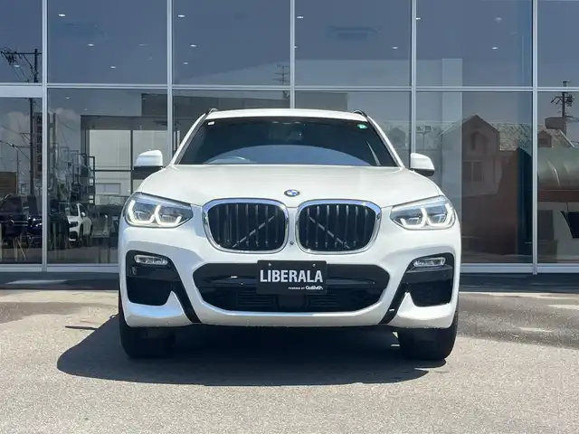 ＢＭＷ Ｘ３ xDrive20d Mスポーツ 岐阜県 2019(令1)年 2.7万km アルピンホワイトⅢ ドライビングアシストプラス/ACCアクティブクルーズ・コントロール（ストップ&ゴー機能付） /ステアリング&レーンコントロールアシスト /レーンディパーチャーウォーニング（車線逸脱警告システム） /レーン・チェンジウォーニング /アクティブ・サイドコリジョン・プロテクション /前車接近警告機能 /衝突回避被害軽減ブレーキ /事故回避アシスト /後車衝突警告機能 /クロストラフィックウォーニング（フロント&リヤ）　/パーキングアシストプラス/パーク・ディスタンス・コントロール （フロント&リヤ、ビジュアル表示機能付） /パーキング・アシスト（並列・縦列） /トップ・ビュー ー サイド・ビューカメラ ー リヤビュー・カメラ（予想進路表示機能付）　/地デジＴＶ　/ヘッドアップディスプレイ ヒートシーター /パワーシート　/純正ナビ　/電動リアゲート