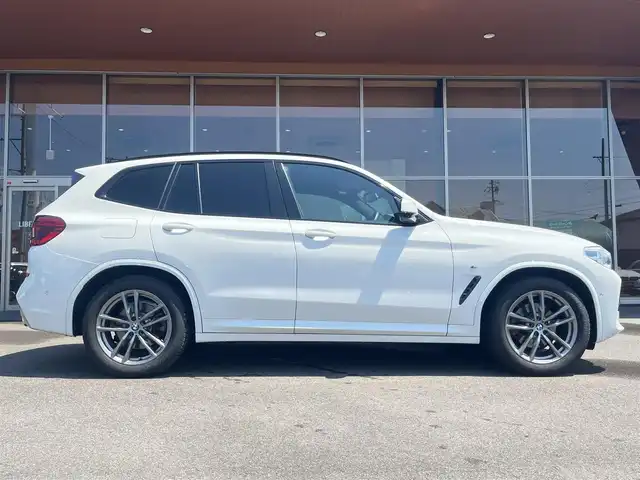 ＢＭＷ Ｘ３ xDrive20d Mスポーツ 岐阜県 2019(令1)年 2.7万km アルピンホワイトⅢ ドライビングアシストプラス/ACCアクティブクルーズ・コントロール（ストップ&ゴー機能付） /ステアリング&レーンコントロールアシスト /レーンディパーチャーウォーニング（車線逸脱警告システム） /レーン・チェンジウォーニング /アクティブ・サイドコリジョン・プロテクション /前車接近警告機能 /衝突回避被害軽減ブレーキ /事故回避アシスト /後車衝突警告機能 /クロストラフィックウォーニング（フロント&リヤ）　/パーキングアシストプラス/パーク・ディスタンス・コントロール （フロント&リヤ、ビジュアル表示機能付） /パーキング・アシスト（並列・縦列） /トップ・ビュー ー サイド・ビューカメラ ー リヤビュー・カメラ（予想進路表示機能付）　/地デジＴＶ　/ヘッドアップディスプレイ ヒートシーター /パワーシート　/純正ナビ　/電動リアゲート