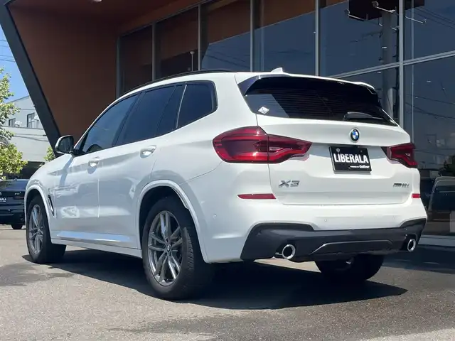 ＢＭＷ Ｘ３ xDrive20d Mスポーツ 岐阜県 2019(令1)年 2.7万km アルピンホワイトⅢ ドライビングアシストプラス/ACCアクティブクルーズ・コントロール（ストップ&ゴー機能付） /ステアリング&レーンコントロールアシスト /レーンディパーチャーウォーニング（車線逸脱警告システム） /レーン・チェンジウォーニング /アクティブ・サイドコリジョン・プロテクション /前車接近警告機能 /衝突回避被害軽減ブレーキ /事故回避アシスト /後車衝突警告機能 /クロストラフィックウォーニング（フロント&リヤ）　/パーキングアシストプラス/パーク・ディスタンス・コントロール （フロント&リヤ、ビジュアル表示機能付） /パーキング・アシスト（並列・縦列） /トップ・ビュー ー サイド・ビューカメラ ー リヤビュー・カメラ（予想進路表示機能付）　/地デジＴＶ　/ヘッドアップディスプレイ ヒートシーター /パワーシート　/純正ナビ　/電動リアゲート