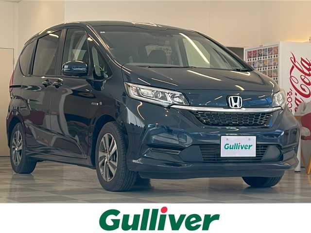 ホンダ フリード ハイブリット G ホンダセンシング 岐阜県 2021(令3)年 3.3万km ミッドナイトブルービームM 純正ナビゲーション/バックモニター/Bluetooth/テレビ/CD/DVD/両側電動スライドドア/ホンダセンシング/追従クルーズコントロール/Ｓパッケージ/純正15インチアルミホイール/ＬＥＤヘッドライト/オートライト/ハーフレザーシート/シートヒーター/ナビ連動ドライブレコーダー/プッシュスタート/スマートキー/クリアランスソナー/USBポート