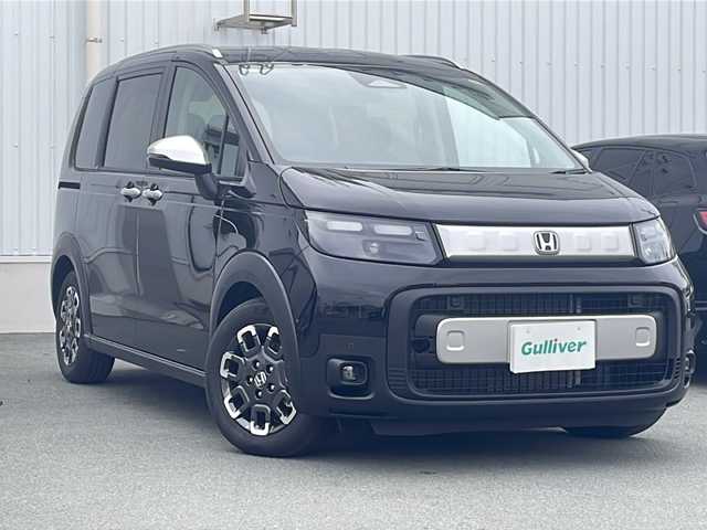 ホンダ フリード ハイブリット e:HEV クロスター 三重県 2025(令7)年 0.1千km 黒 純正９インチコネクトナビ/アップルカープレイ/ＢＳＭ/両側パワースライドドア/バックカメラ/前席シートヒーター/追従クルーズコントロール/コーナーセンサー/ＵＳＢ給電/ＬＥＤ/ハーフレザーシート/ステアリングリモコン/禁煙車