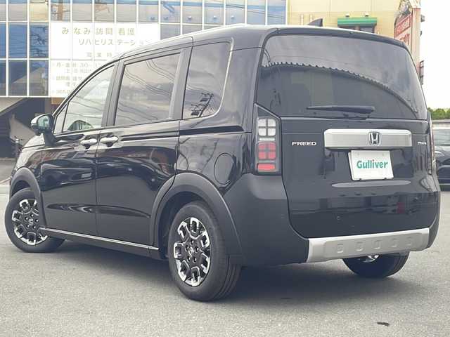 ホンダ フリード ハイブリット e:HEV クロスター 三重県 2025(令7)年 0.1千km 黒 純正９インチコネクトナビ/アップルカープレイ/ＢＳＭ/両側パワースライドドア/バックカメラ/前席シートヒーター/追従クルーズコントロール/コーナーセンサー/ＵＳＢ給電/ＬＥＤ/ハーフレザーシート/ステアリングリモコン/禁煙車