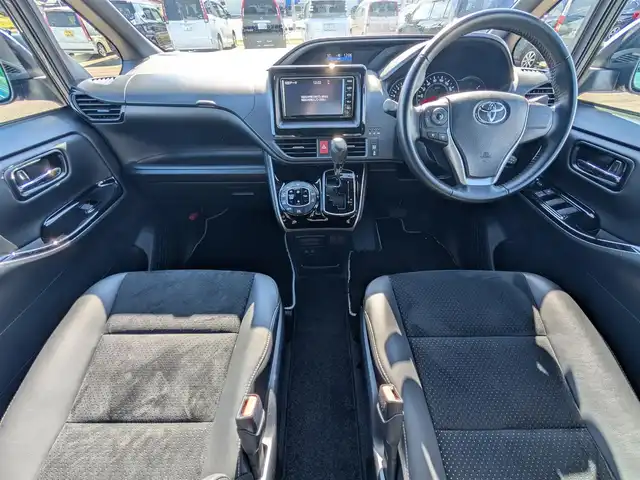 トヨタ ヴォクシー ZS 煌Ⅲ 福井県 2020(令2)年 1.5万km ブラッキッシュアゲハガラスフレーク 純正SDナビ/AM/FM/ワンセグ/BT/CD/AUX/バックカメラ/両側パワースライドドア/トヨタセーフティセンス/クルーズコントロール/前後コーナーセンサー/レーンキープアシスト/横滑り防止装置/盗難防止装置/アイドリングストップ/ビルトインETC/ハーフレザー調シート/本革巻きステアリング/ダブル＋サイドエアバッグ/カーテンエアバッグ/純正フロアマット/サンシェード/純正16インチAW/LEDヘッドライト/Fフォグ/スマートキー