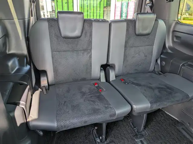 トヨタ ヴォクシー ZS 煌Ⅲ 福井県 2020(令2)年 1.5万km ブラッキッシュアゲハガラスフレーク 純正SDナビ/AM/FM/ワンセグ/BT/CD/AUX/バックカメラ/両側パワースライドドア/トヨタセーフティセンス/クルーズコントロール/前後コーナーセンサー/レーンキープアシスト/横滑り防止装置/盗難防止装置/アイドリングストップ/ビルトインETC/ハーフレザー調シート/本革巻きステアリング/ダブル＋サイドエアバッグ/カーテンエアバッグ/純正フロアマット/サンシェード/純正16インチAW/LEDヘッドライト/Fフォグ/スマートキー