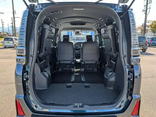 トヨタ ヴォクシー ZS 煌Ⅲ 福井県 2020(令2)年 1.5万km ブラッキッシュアゲハガラスフレーク 純正SDナビ/AM/FM/ワンセグ/BT/CD/AUX/バックカメラ/両側パワースライドドア/トヨタセーフティセンス/クルーズコントロール/前後コーナーセンサー/レーンキープアシスト/横滑り防止装置/盗難防止装置/アイドリングストップ/ビルトインETC/ハーフレザー調シート/本革巻きステアリング/ダブル＋サイドエアバッグ/カーテンエアバッグ/純正フロアマット/サンシェード/純正16インチAW/LEDヘッドライト/Fフォグ/スマートキー