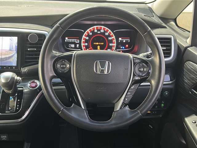 ホンダ オデッセイ アブソルート 東京都 2015(平27)年 10.8万km ホワイトオーキッドパール (株)IDOMが運営する【じしゃロン国分寺店】の自社ローン対象車両になります。こちらは現金ご利用時の価格です。自社ローンご希望の方は別途その旨お申付け下さい。/ホンダセンシング/両側パワースライドドア/Gathersフリップダウンモニター/純正メモリナビ（Gathers VXM-155VFEi）/フルセグテレビ/フロントカメラ・バックカメラ/ETC