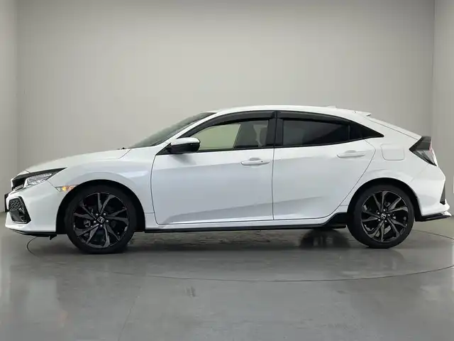 ホンダ シビック ハッチバック ホンダセンシング 愛知県 2019(令1)年 2.9万km ホワイトオーキッドパール 純正ナビ　フルセグＴＶ　Ｂｌｕｅｔｏｏｔｈ　バックカメラ　シートヒーター　純正ドラレコナビ連動　ＥＴＣ　ホンダセンシング　衝突軽減　追従クルコン　コーナーセンサー　ＬＥＤオートライト　フォグ　禁煙車