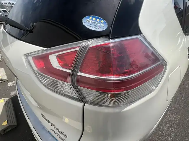 日産 エクストレイル ハイブリッド モード・プレミア 秋田県 2016(平28)年 9.7万km ブリリアントホワイトパール ４WD/衝突軽減システム/LEDヘッドライト/社外アルミ/スマートキー/アイドリングストップ/プッシュスタート/コーナーセンサー/ダウンヒルアシストコントロール/ステアリングスイッチ/前席シートヒーター/純正エンジンスターター/ETC/ルーフレール/純正フロアマット/純正ドアバイザー/オートライト/オートエアコン/パワーステアリング/パワーウィンドウ/横滑り防止/電動格納ウィンカーミラー/保証書/取扱説明書/記録簿